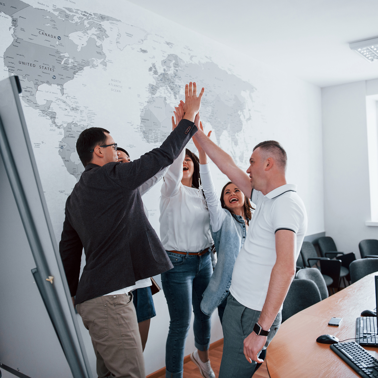 You are awesome, congratulations. Business people and manager working on their new project in classroom